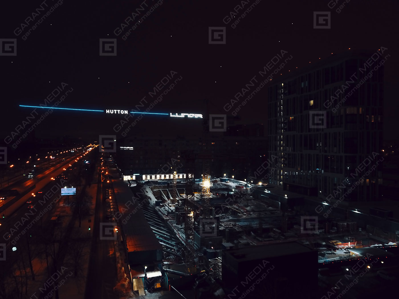 Брендирование башенных кранов в Москве "HUTTON"